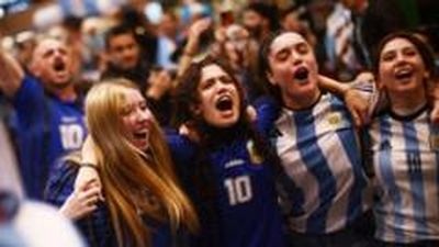 Argentina fans at home and in the US celebrate their progression to the World Cup final.