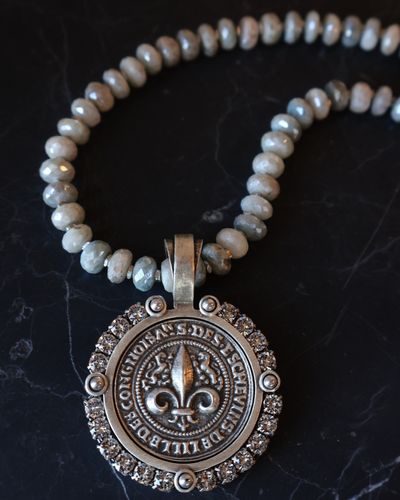 âœ¨ Every FK bezel is meticulously designed by Kande herself â€” made to do more than hold a medalli