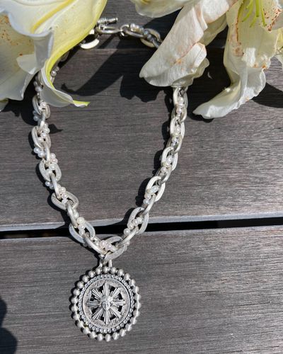 Discover our Haisley necklace featuring micropearls woven into silver Lourdes chain and accented by 