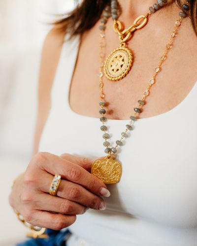 Stunning combination of labradorite and gold, beautifully showcased by @gwenliveswell ! ðŸŒŸ Known f