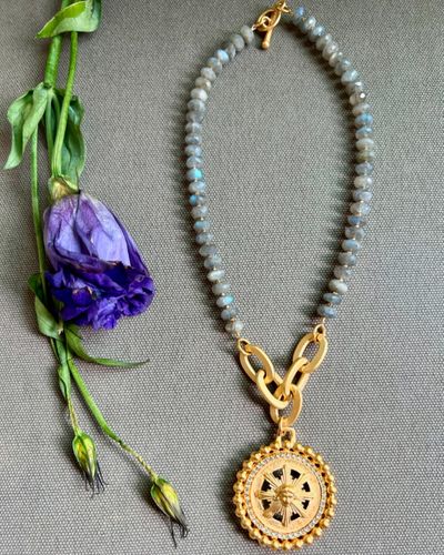 Labradorite and goldâ€”a match made in jewelry heaven! Adorn yourself with the iridescent beauty of 