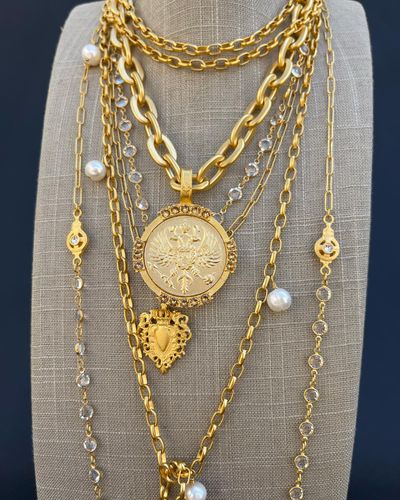 Delicious 24k gold-plates chains, peppered with real freshwater pearls, Austrian crystals and our vi