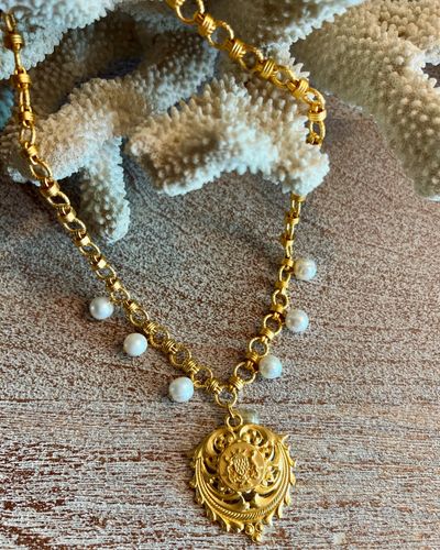 âœ¨ Introducing the FK Harper necklace! This stunning piece features a vintage French pendant with t